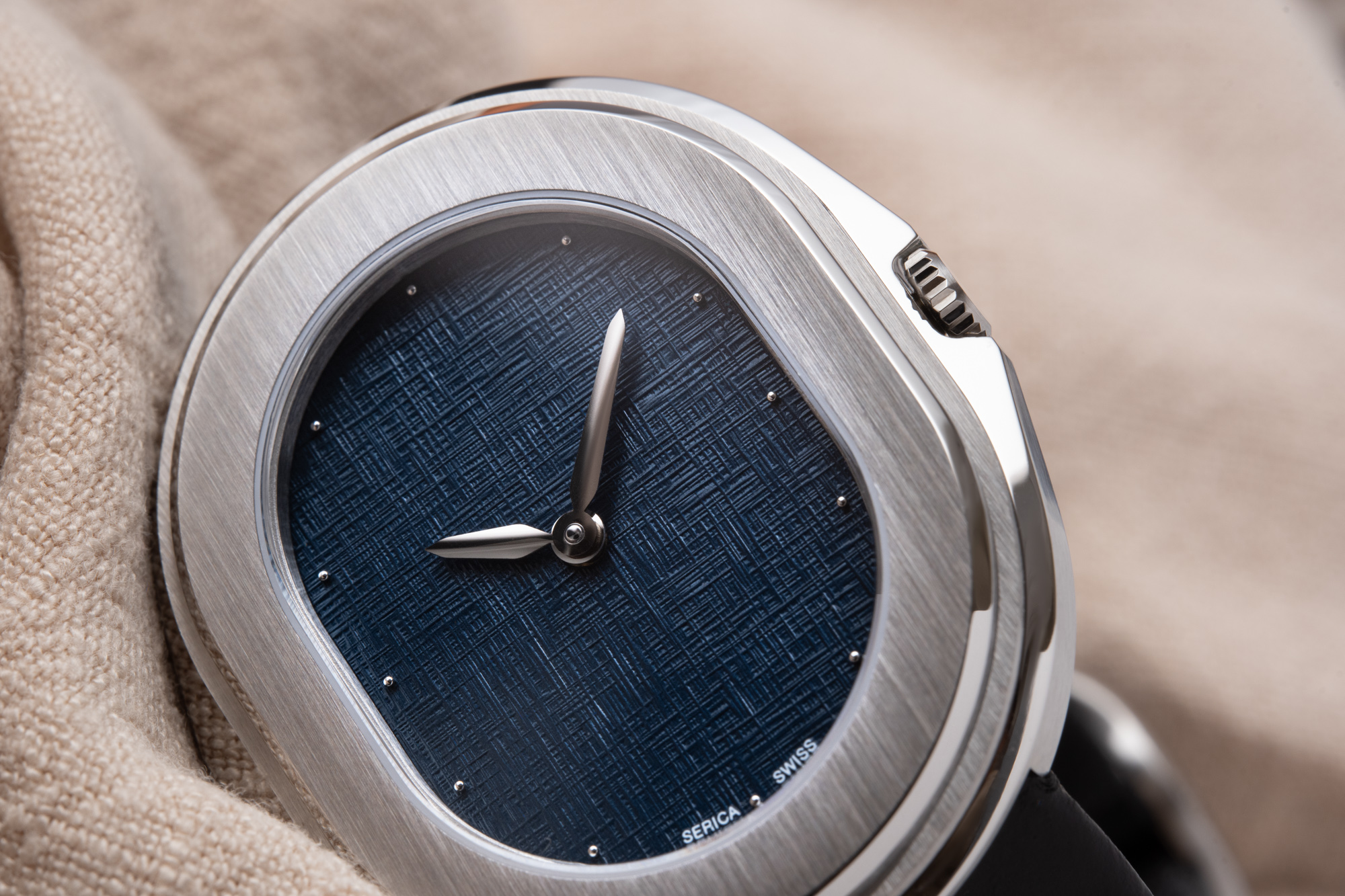 Macro close-up of Serica 1174 Parade black dial with applied markers and gold-tone hands